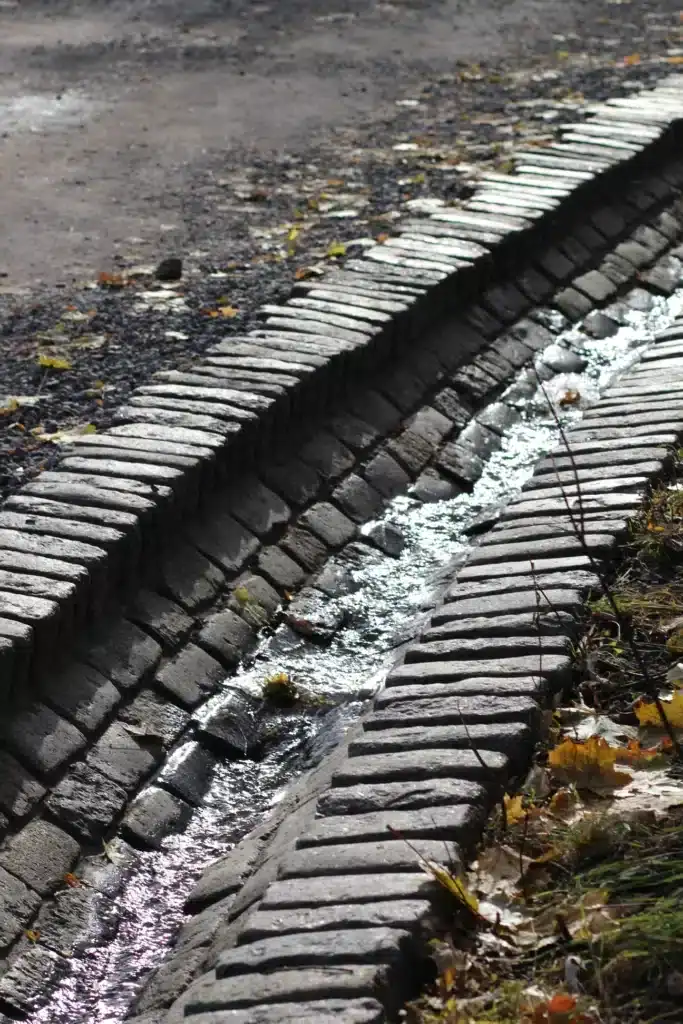 Efficient brick-lined drainage channel for effective land and water management.